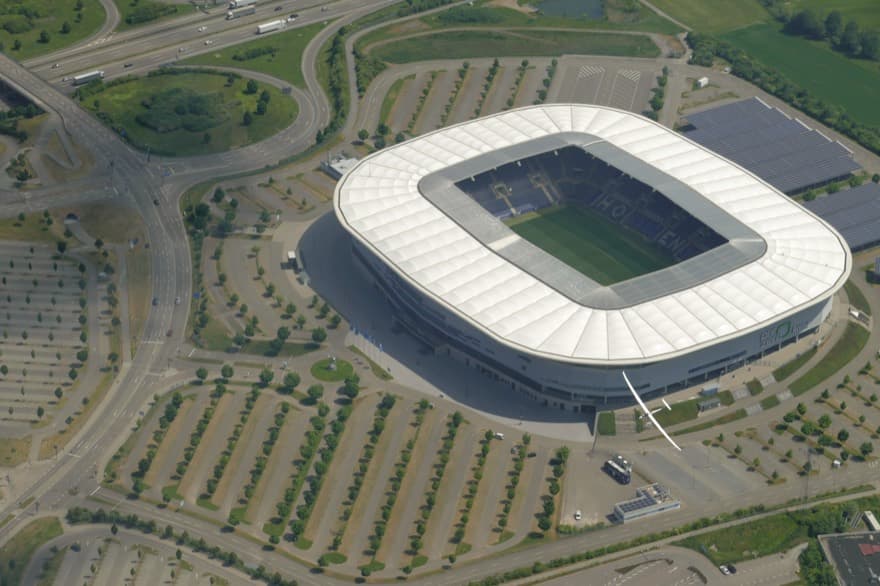 Aerial view of the PreZero Arena in Hoffenheim. Above the football arena, a low-flying glider from the nearby glider airfield. Picture taken from a gyrocopter a