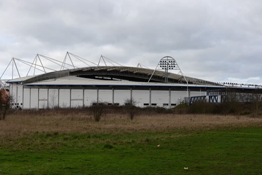 Looking at the MKM Stadium, home of football club Hull City and rugby league club Hull F.C., from the eastern footpath leading to the stadium from Argyle Street